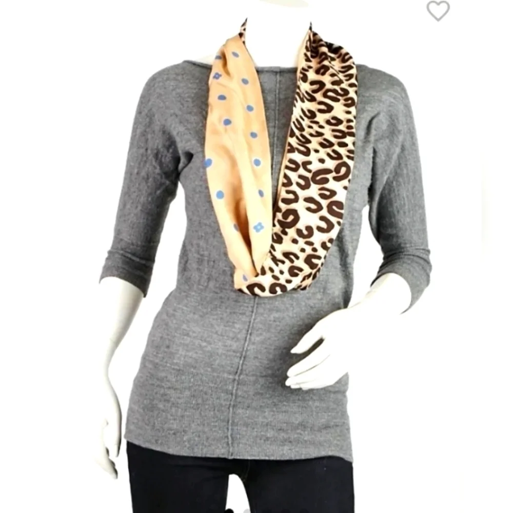 Louis Vuitton Stephen sprouce infinity scarf.